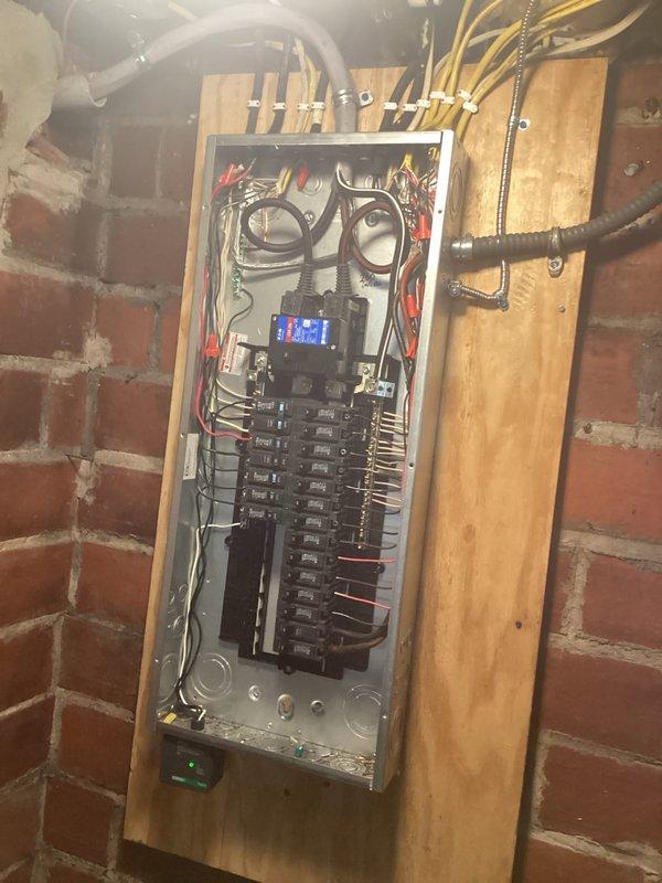 Completed 150-amp service panel upgrade with installation of whole home surge protector. Replaced outdated breaker panel with new unit, ensuring proper wire connections and circuit organization throughout the system. All work was completed to code with new breakers installed and properly labeled for improved electrical safety and reliability.