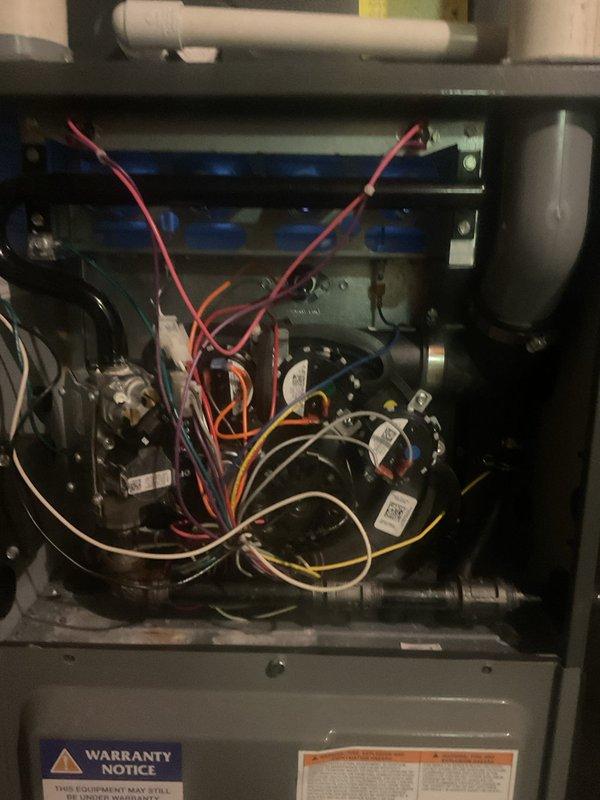 Performed scheduled heating maintenance on Amana furnace system. Inspected electrical components, wiring connections, and control board for proper operation. Examined PVC venting system and verified all connections were secure with no visible issues.