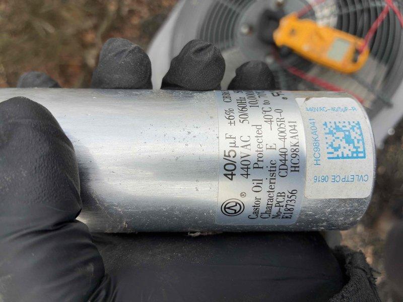 Responded to emergency no-cool call for central air system under 5 years old that was incorrectly running after attempted shutdown. Diagnostic testing with UEI Phoenix PRO-DL379 clamp meter revealed failed dual-run capacitor (40/5μF ±6% CBB65, 440V AC). Replaced defective capacitor and verified proper system operation with normal amperage readings.