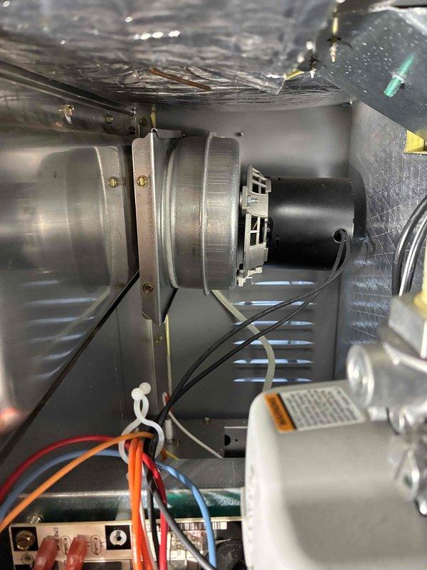 Performed routine heating maintenance service including temperature verification (169°F) of system components and inspection of blower motor assembly. Checked electrical connections and verified proper operation of all system components.