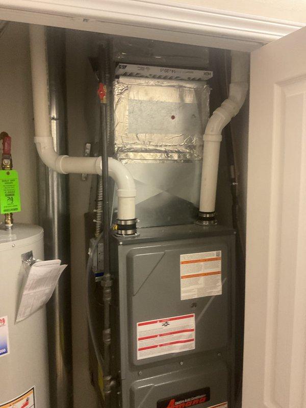Performed first-year heating maintenance on residential furnace system. Conducted comprehensive inspection of electrical components, control boards, and ventilation system including PVC exhaust piping. All connections verified secure, system tested for proper operation with no issues identified.