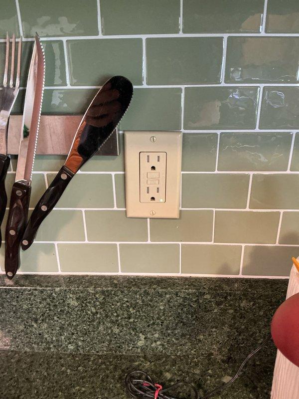 Completed installation of GFCI outlets in kitchen area and utility room to ensure electrical safety compliance. Verified proper grounding and functionality of all installed receptacles with successful testing of circuit protection features.