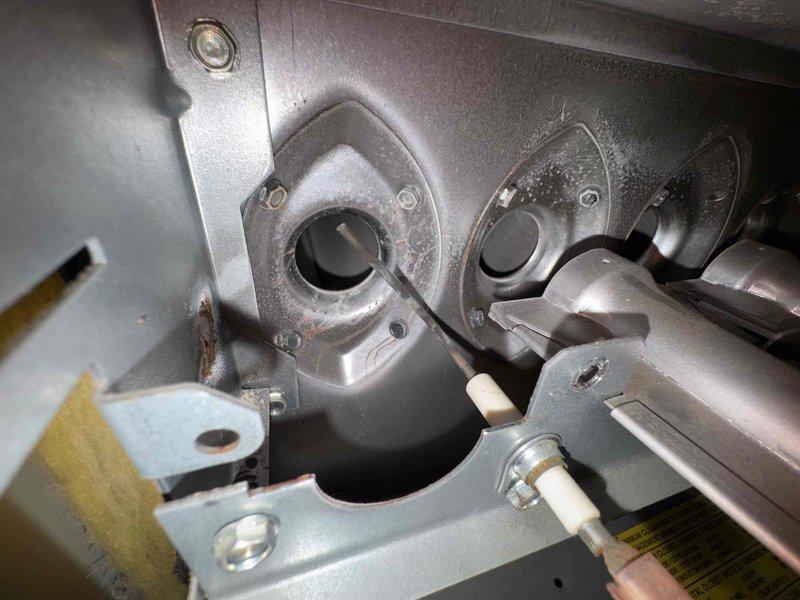 Diagnosed no-heat complaint in furnace under 10 years old, finding condensation on heat exchanger and burner assembly. Inspected blower motor and determined it was operational, but discovered ignition failure due to moisture contamination. Cleaned affected components, verified proper ignition sequence and confirmed normal heat output before completing service.