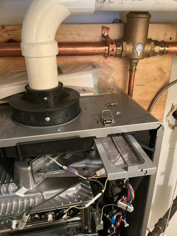 Performed scheduled heating maintenance service on residential furnace system. Inspected copper piping connections, PVC venting, and internal components including wiring harnesses and heat exchanger. Verified proper operation of pump motor, gas valve assembly, and digital control panel while ensuring all electrical connections were secure.