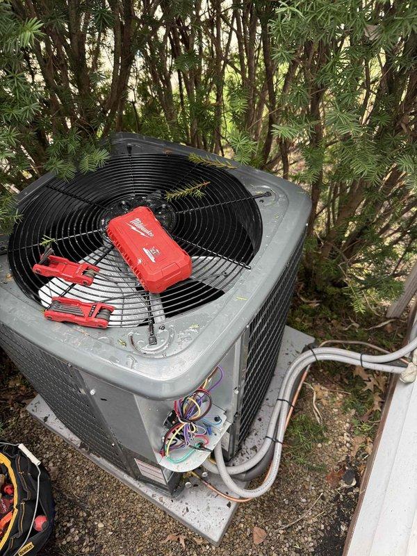 Completed installation of a new 80% efficiency furnace and air conditioning system. The outdoor condenser unit was properly mounted on a concrete pad with secure electrical connections and insulated refrigerant lines. System was financed and all components were tested for optimal performance.