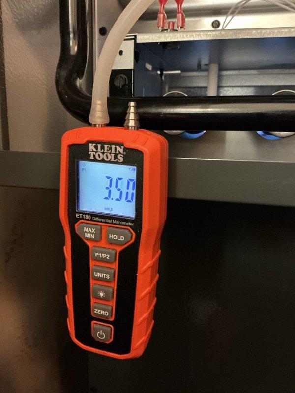 Performed scheduled heating maintenance service on furnace system. Conducted gas pressure testing with Klein Tools ET180 Differential Manometer showing 3.50 inH2O reading, confirming proper gas supply to unit. Inspected electrical panel connections to verify proper power supply to the heating system.
