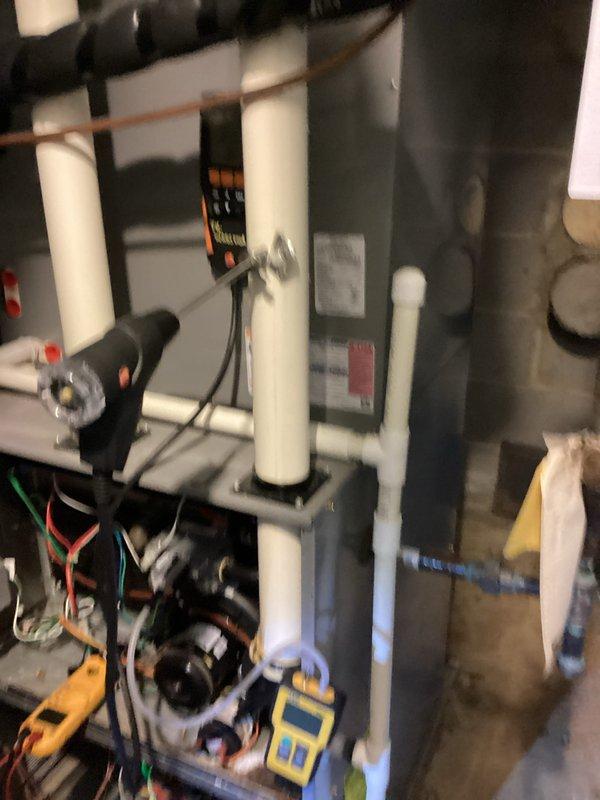 Performed routine heating maintenance on residential HVAC system. Conducted comprehensive electrical testing using UEi G2 PHOENIX multimeter, obtaining readings of 0.991 and 0.142. Inspected furnace, PVC venting, copper supply lines, and associated electrical components to ensure proper operation.