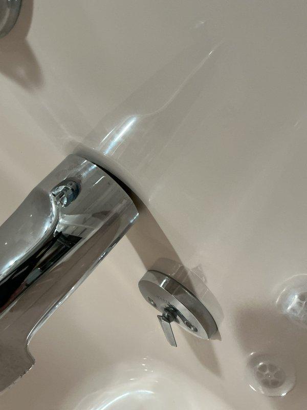 Responded to a service call regarding water leakage into basement from refrigerator water line. Inspected plumbing connections and discovered kinked water supply line to refrigerator. Replaced damaged basement shut-off valve and properly reinstalled water line to eliminate leak.