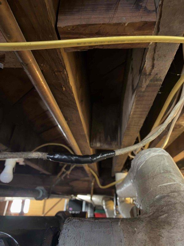 Responded to a callback for no heat on a recently installed system. Upon inspection of the basement area, discovered loose insulation on refrigerant lines and improper sealing at ductwork connections. Secured insulation, sealed all connections, and verified proper system operation before departure.