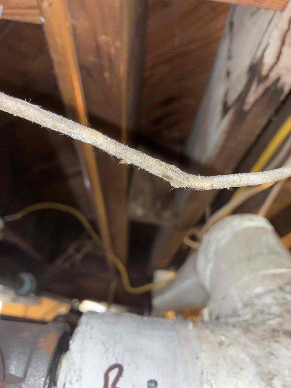 Responded to a callback for no heat on a recently installed system. Upon inspection of the basement area, discovered loose insulation on refrigerant lines and improper sealing at ductwork connections. Secured insulation, sealed all connections, and verified proper system operation before departure.