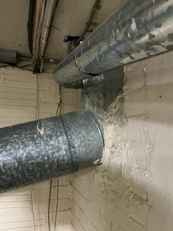 Conducted assessment of existing boiler system and presented repair options to client. Inspected galvanized ductwork in utility area, noting connection points requiring attention. Examined PVC plumbing configuration and ventilation components to determine optimal heating solution.
