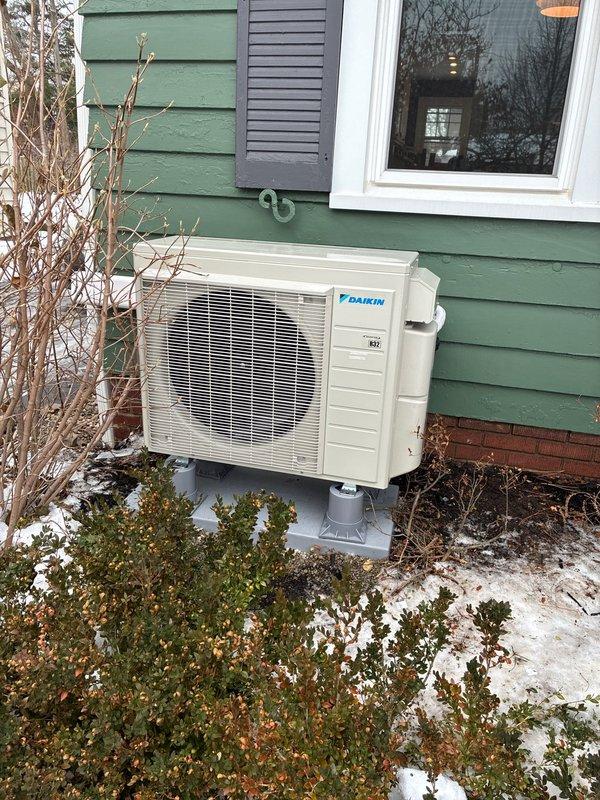 Completed installation of a 5-head mini-split system with 2 Daikin condensers mounted on concrete pads. Performed pressure testing with Testo 568s digital gauge to verify system integrity, achieving 502.5 psi during leak detection procedures. System was properly installed with coordination with electrical contractor for final connections.