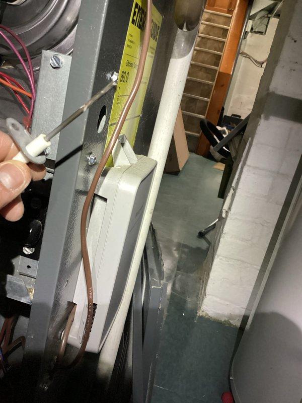 Conducted routine heating maintenance on furnace system. Performed electrical inspection of control board wiring connections and measured voltage/amperage readings with UEi Phoenix PRO DL379 multimeter, confirming proper electrical parameters (00.35/0.130) within manufacturer specifications.