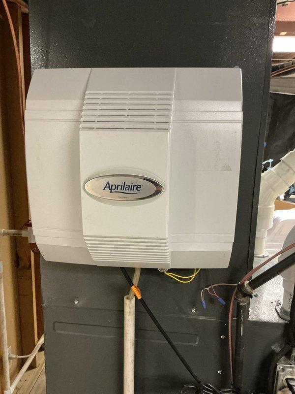 Completed scheduled heating maintenance service on furnace system. Inspected Aprilaire whole-home humidifier which appears properly installed with all wiring intact. Replaced standard pleated air filters with new units to ensure optimal system performance and indoor air quality.