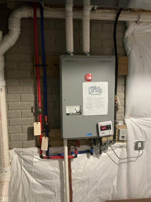 Responded to service call for multiple plumbing issues. Performed diagnostic inspection of continuously running toilet and identified leak source. Accessed ceiling panel to inspect plumbing infrastructure and examined Prestige tankless water heater experiencing error codes when kitchen faucet was in use. Repaired disconnected drain stopper in master bathroom.