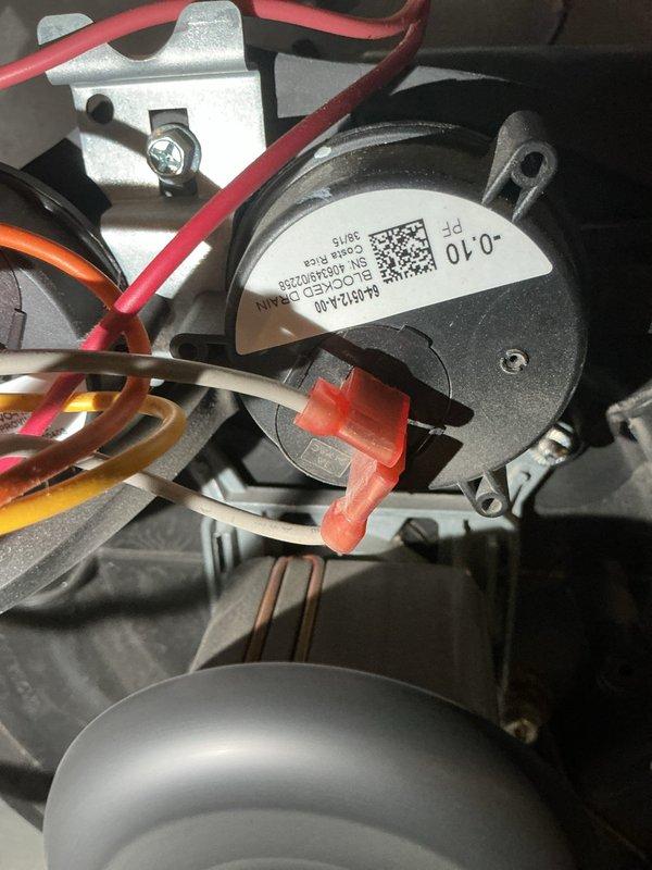 Performed routine heating maintenance inspection. Identified and documented significant rust and corrosion on metal components of the system. Inspected pressure switch connections and verified proper wiring of control circuits.