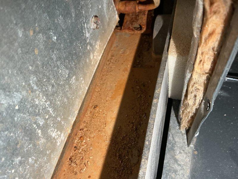 Performed routine heating maintenance inspection. Identified and documented significant rust and corrosion on metal components of the system. Inspected pressure switch connections and verified proper wiring of control circuits.