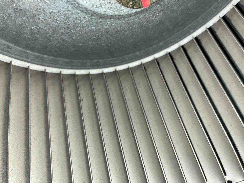 Performed scheduled heating maintenance service on customer's furnace system. Inspected heat exchanger and fins for proper operation, finding minimal dust accumulation and normal working condition. Examined the Aprilaire humidifier mounted on ductwork, verifying proper installation and connections to ensure optimal system performance during heating season.