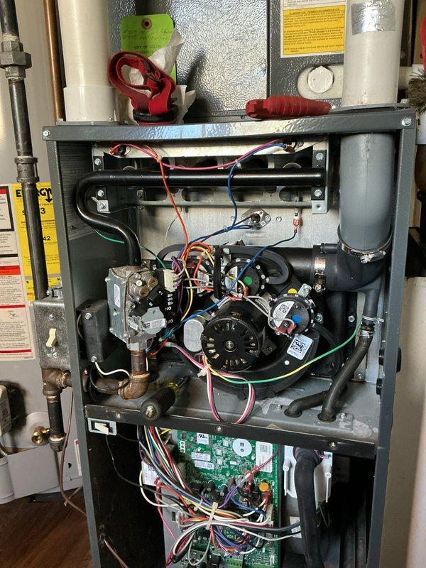 Performed scheduled heating maintenance on furnace system, including inspection of internal components (motor assembly, circuit board, gas lines, ventilation). Also examined bathroom exhaust fan functionality as part of comprehensive HVAC evaluation. All systems operating within normal parameters with no issues detected.