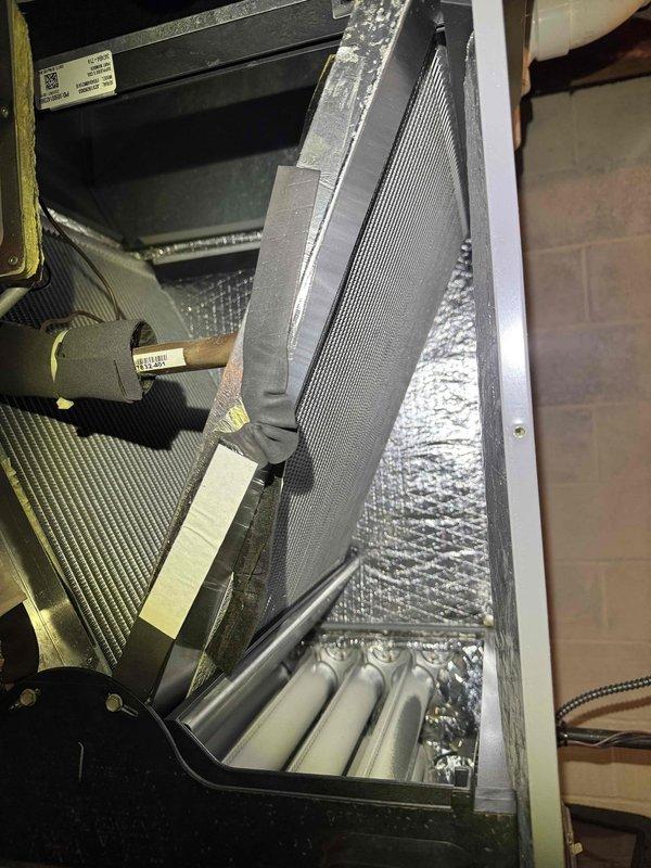 Performed comprehensive furnace tune-up including inspection of blower motor assembly with wiring harness and heat exchanger components. Verified proper operation of all mechanical systems, inspected refrigerant lines, and confirmed all electrical connections were secure. System is operating within normal parameters with no issues detected.