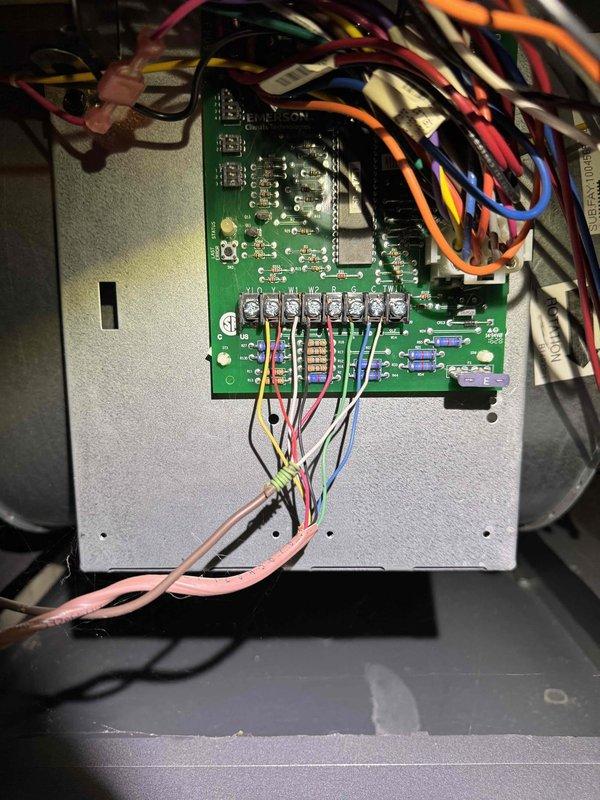 Responded to no-heat complaint after power outage. Inspected control board with multiple wire connection points and found failed electronic components. Replaced faulty valve/connector assembly that showed signs of discoloration and residue buildup, restoring system operation and heat function.