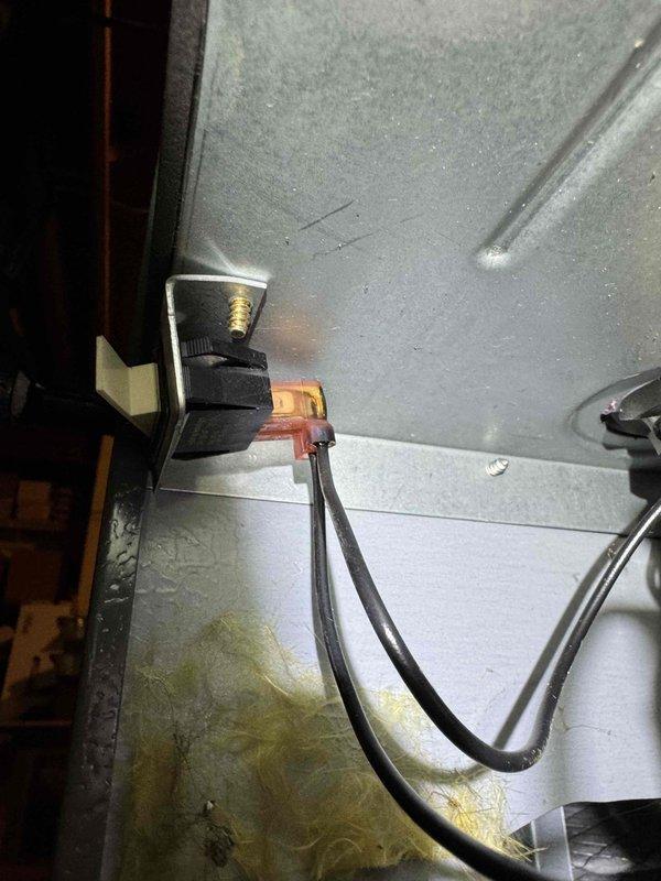 Responded to no-heat complaint after power outage. Inspected control board with multiple wire connection points and found failed electronic components. Replaced faulty valve/connector assembly that showed signs of discoloration and residue buildup, restoring system operation and heat function.