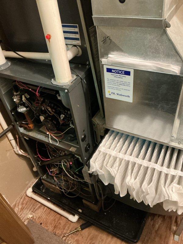 Performed scheduled preventative maintenance on multiple heating systems including furnace and water boiler. Inspected internal components of furnace unit (wiring, electronic parts, copper piping) and examined air handler with filter. Checked plumbing components including PVC piping and valve controls to ensure proper operation of the integrated HVAC system.