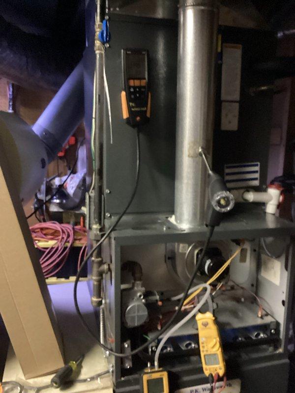 Performed scheduled heating maintenance on furnace system. Conducted comprehensive diagnostic testing using Testo 310 analyzer to verify proper combustion efficiency (9.2%) and temperature readings (33.8°F). Inspected internal components with access panel removed, ensuring proper operation of all mechanical and electrical elements.