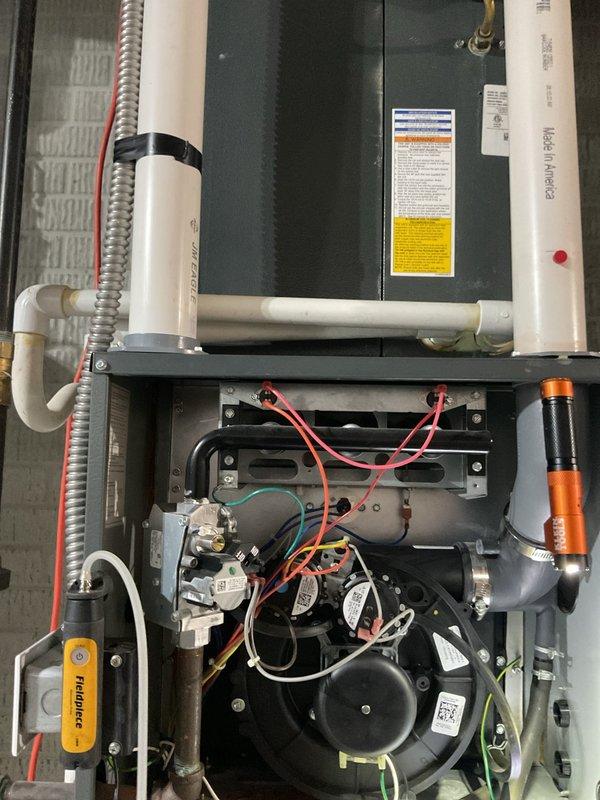 Performed comprehensive maintenance on residential furnace system, including inspection of blower motor, electrical connections, and gas line components. Verified proper operation of PVC venting system and checked integrity of ductwork connections and condensate drain lines. All components functioning within specifications; system is operating efficiently with no issues detected.