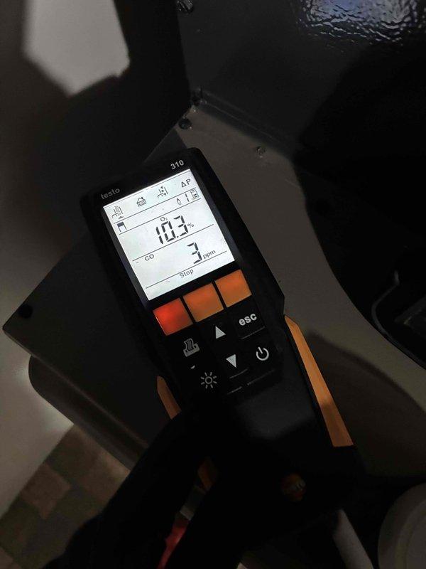 Performed routine heating maintenance including combustion analysis (CO reading 3 ppm, pressure measurement 10.3) and inspection of blower wheel assembly. System operating within normal parameters.