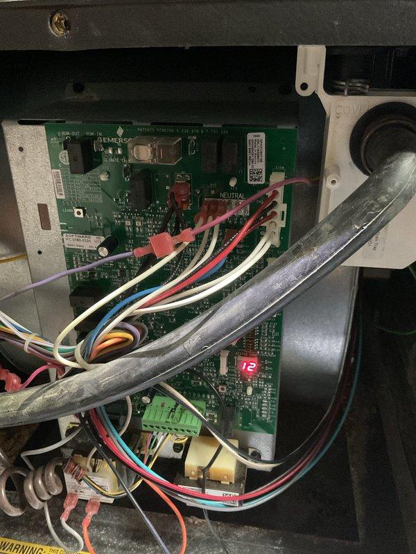 Performed scheduled maintenance on two heating systems. Inspected circuit boards and electrical components for proper operation, noting normal readings on digital display. Examined blower assembly, motor, and ventilation components - all systems functioning within normal parameters with no signs of wear or damage.