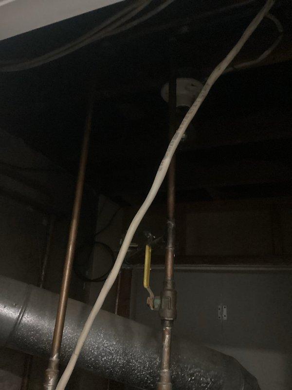 Conducted site assessment of century-old home's original electrical panel system. Documented severely outdated fuse box with handwritten circuit labels ("PULL," "MAIN," "STOVE") and deteriorated mounting conditions. Provided comprehensive replacement quote for upgrading to modern circuit breaker panel that will meet current electrical code requirements.