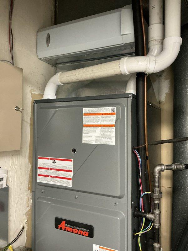 Performed scheduled heating maintenance on Amana furnace system with connected Aprilaire humidifier. Inspected all components including ductwork, PVC ventilation, copper lines, electrical connections, and control systems. All equipment functioning properly with no issues identified; system is operating at optimal performance.