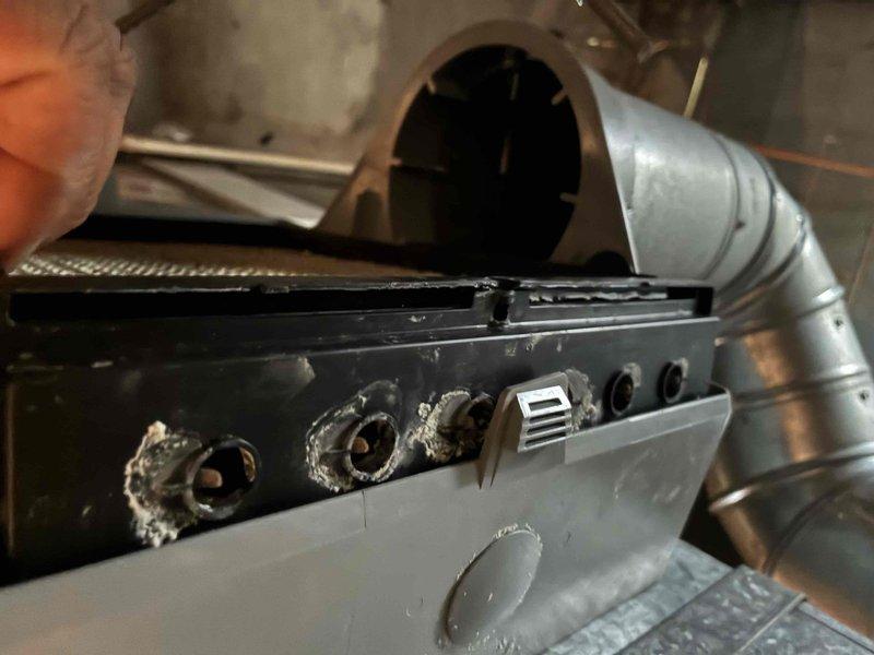 Responded to service call regarding water leakage from humidifier after customer replaced water panel. Inspection revealed significant damage to the humidifier control panel with multiple burn/melt holes compromising the unit's integrity. Replaced damaged control panel and verified proper operation with no further leakage.