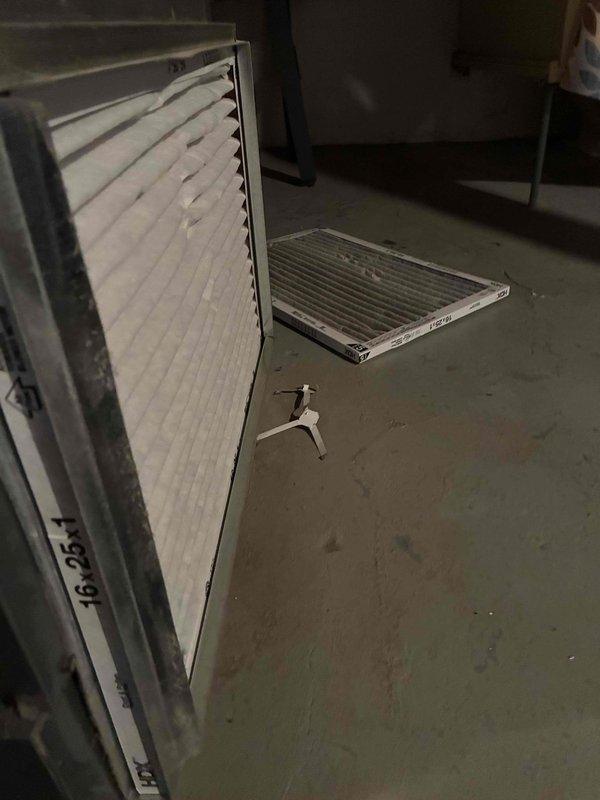 Performed routine heating system maintenance including filter replacement and combustion analysis. Removed and replaced air filter (16x25) and conducted combustion efficiency testing with Testo analyzer, which showed 12.9% CO2 and 5ppm CO levels, indicating proper system operation.