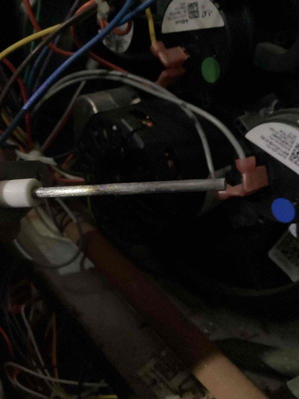 Performed scheduled heating maintenance on a 10+ year old system. Inspected electrical components including fan assembly and wiring connections. Examined heat exchanger fins for proper condition and functionality. All components functioning within normal parameters at completion of service.