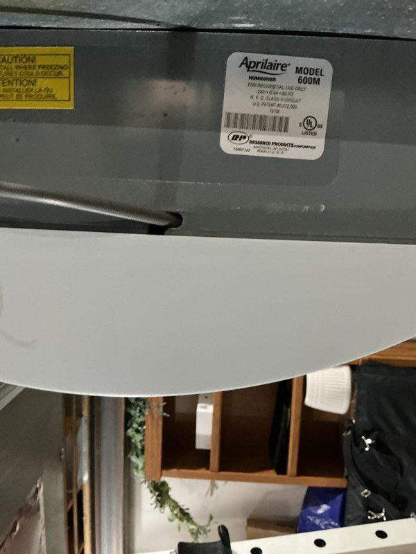 Performed scheduled heating maintenance service on dual system installation. Inspected primary furnace unit with connected ductwork and PVC venting; all components found in proper working condition with no visible issues. Examined Aprilaire Model 600M humidifier; verified proper mounting and functionality with no signs of damage or corrosion.