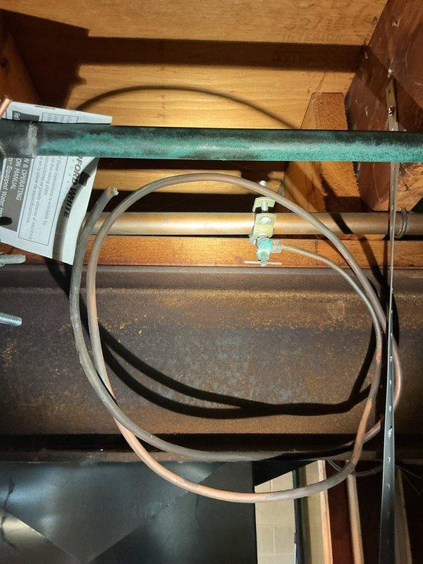 Performed scheduled hot water tank maintenance. Inspected copper supply lines, pressure relief valve, and brass fittings for proper operation and signs of leakage. Verified secure attachment of flexible connectors and examined tank for proper venting configuration.