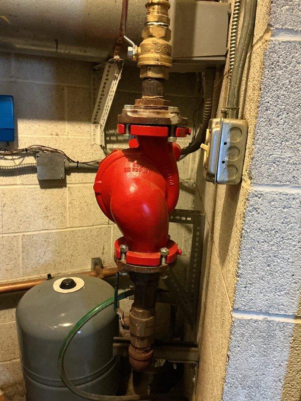 Performed scheduled heating maintenance on dual-system installation consisting of a Weil-McLain boiler with associated copper piping and expansion tank, plus secondary heating loop with red pump assembly. Inspected all components including valves, pressure gauges, and electrical connections; confirmed proper operation of both systems with no leaks or abnormal wear detected.