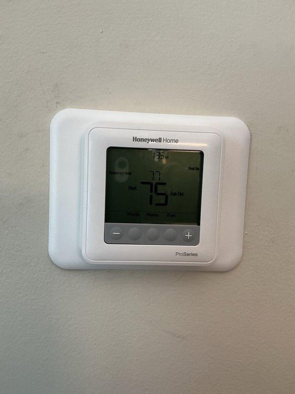 Responded to service call for communication issue between thermostat and newly installed furnace. Diagnosed and resolved connectivity problem with Honeywell Home ProSeries thermostat. Verified proper operation of the complete HVAC system including the Aprilaire whole-home humidifier.