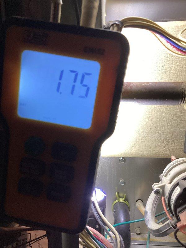 Performed scheduled heating maintenance inspection that revealed moisture damage on interior wall surface. Diagnostic testing with moisture meter showed elevated readings of 1.75 in the affected area. System components were examined with special attention to potential condensation or leak sources near the damaged wall section.