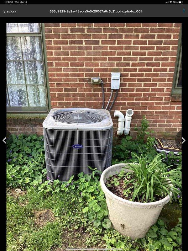 Conducted full system evaluation of aging Carrier AC unit showing high repair costs. Documented current installation against brick exterior and reviewed property layout for replacement options. Presented customer with complete system replacement alternatives as a more cost-effective solution than repairing existing equipment.