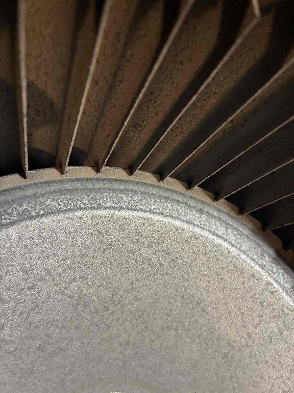 Completed second call to replace inducer motor, pressure switch, collector box and install surge protector. Noted significant corrosion on internal components and accumulated debris on blower wheel, which was thoroughly cleaned. All components now functioning properly with improved system efficiency.