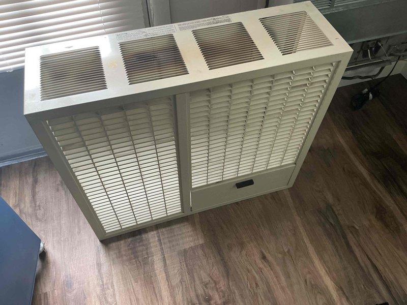 Inspected through-the-wall HVAC unit with a cracked heat exchanger. Documented existing wall-mounted installation and current unit condition with photos. Provided customer with replacement options for through-the-wall configuration to address the safety hazard of the compromised heat exchanger.