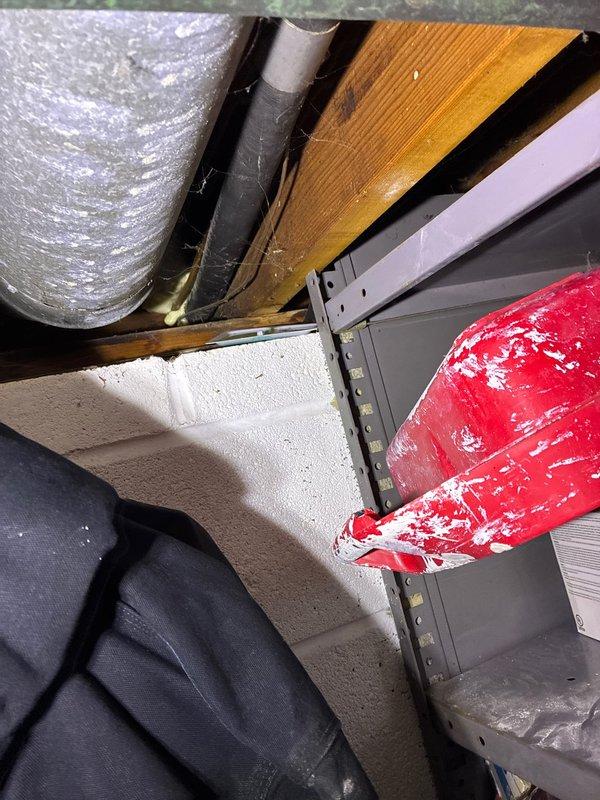 Conducted inspection of damaged AC unit affected by gutter issues. Evaluated HVAC system including ductwork in basement area and verified operation of existing Honeywell thermostat which was reading 69° with heat function operational. Presented replacement options for the damaged air conditioning system.