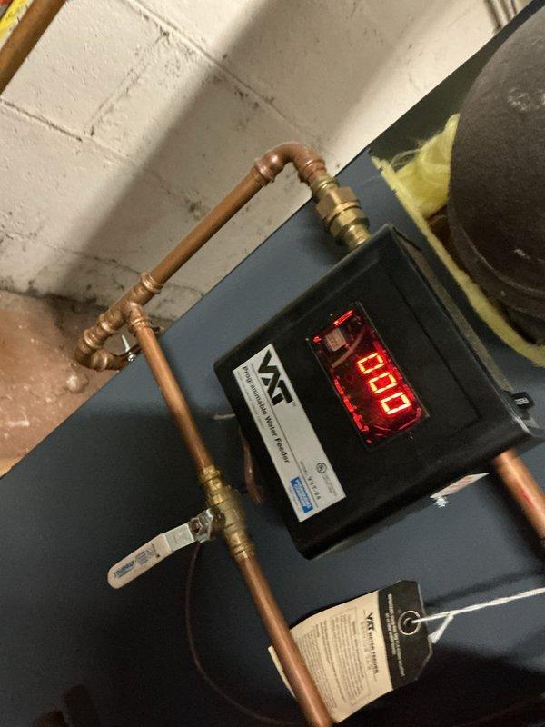 Responded to scheduled service call to clean and repair Style 61 LWCO float system on commercial boiler installation. Inspected digital VAT display unit and associated copper pipe configuration, then serviced the low water cut-off mechanism to ensure proper functionality and safety compliance. Cleaned float assembly and verified proper operation of the valve system before returning unit to service.