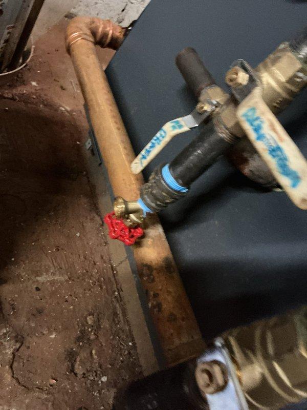 Responded to scheduled service call to clean and repair Style 61 LWCO float system on commercial boiler installation. Inspected digital VAT display unit and associated copper pipe configuration, then serviced the low water cut-off mechanism to ensure proper functionality and safety compliance. Cleaned float assembly and verified proper operation of the valve system before returning unit to service.