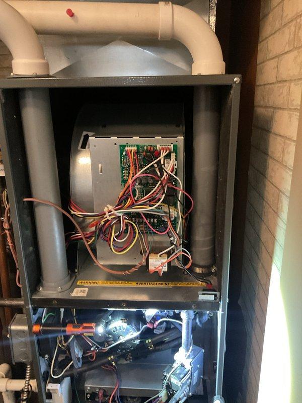 Performed comprehensive heating maintenance on residential furnace system. Inspected electrical connections, circuit board, and gas valve assembly. Verified proper operation of fan motor and all control components.
