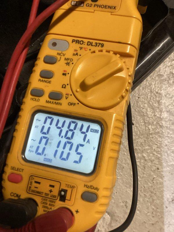 Performed comprehensive heating system electrical diagnostics using UEi G2 PHOENIX PRO multimeter. Conducted amperage testing (0.484A) and voltage verification (0.105V) on system components. Additionally measured temperature readings (73.9°) to confirm proper thermal operation of the heating system.