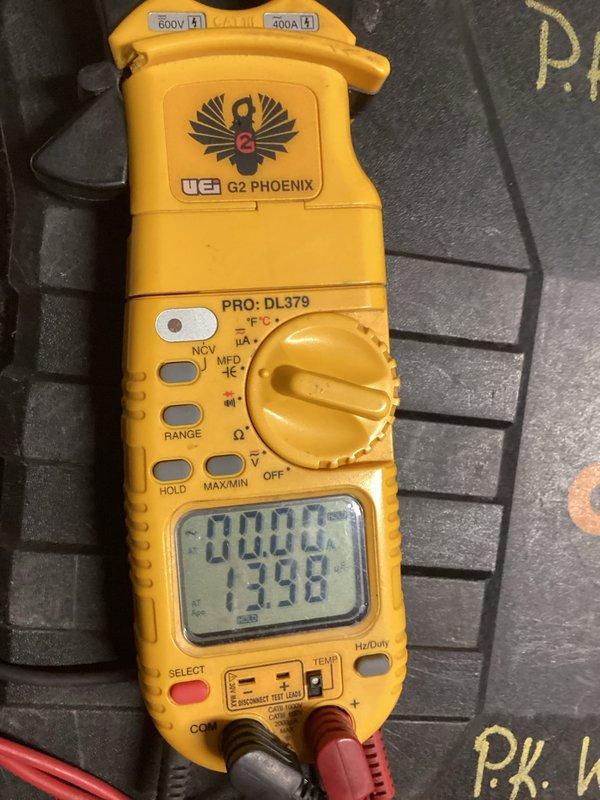 Performed comprehensive heating system electrical diagnostics using UEi G2 PHOENIX PRO multimeter. Conducted amperage testing (0.484A) and voltage verification (0.105V) on system components. Additionally measured temperature readings (73.9°) to confirm proper thermal operation of the heating system.
